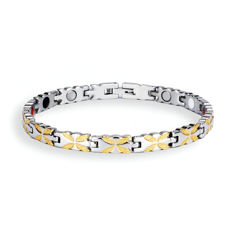 Bracelet femme en titane argenté avec motifs croisés dorés, design magnétique à ions négatifs.
