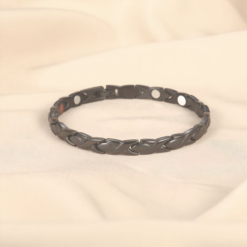 Bracelet magnétique titane noir avec maillons plats et incrustations de tourmalines.