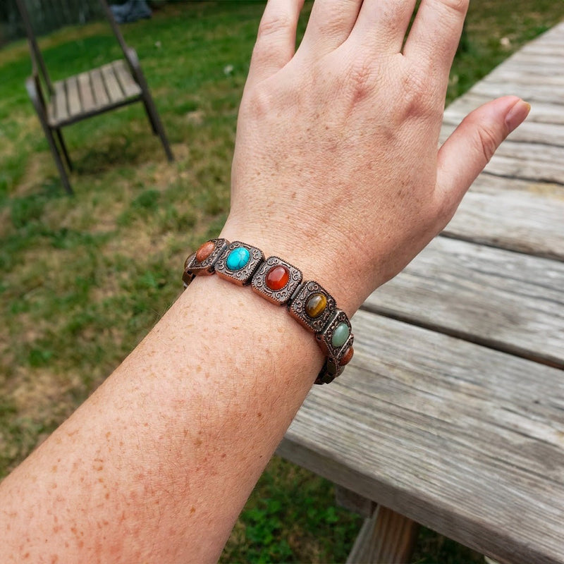 Bracelet cuivre maillons larges ornés de pierres naturelles turquoise, cornaline et œil-de-tigre, style masculin robuste.