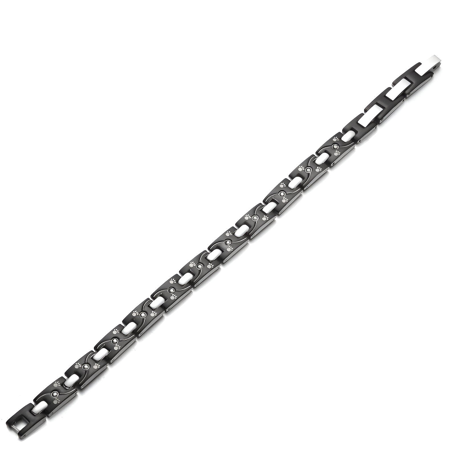 Bracelet magnétique gris en titane pour homme avec maillons rectangulaires et détails découpés en forme de pattes d'animal.