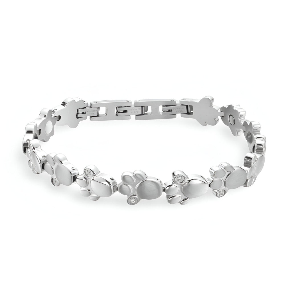 Bracelet magnétique en titane argenté pour homme avec motifs pattes d'animal en relief.