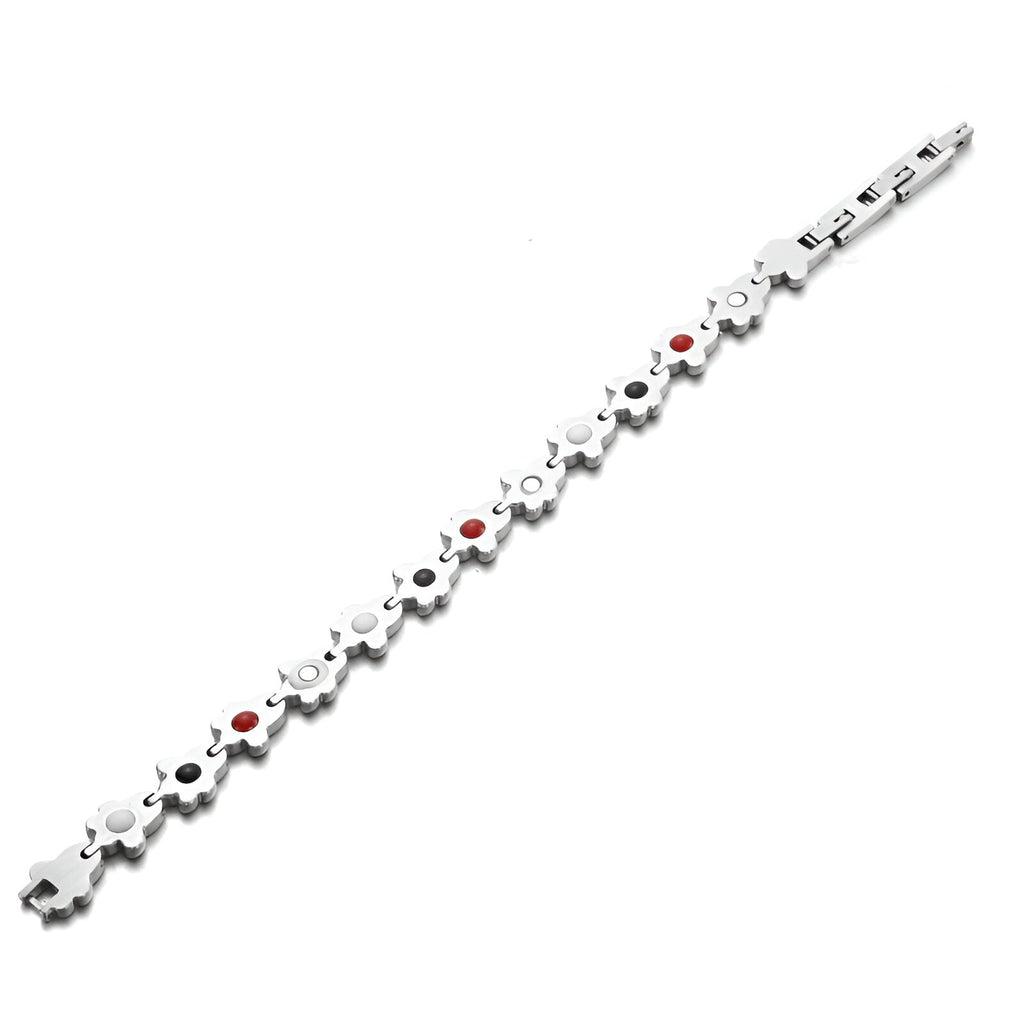 Bracelet magnétique en titane argenté avec motifs de pattes d'animal et détails rouges.