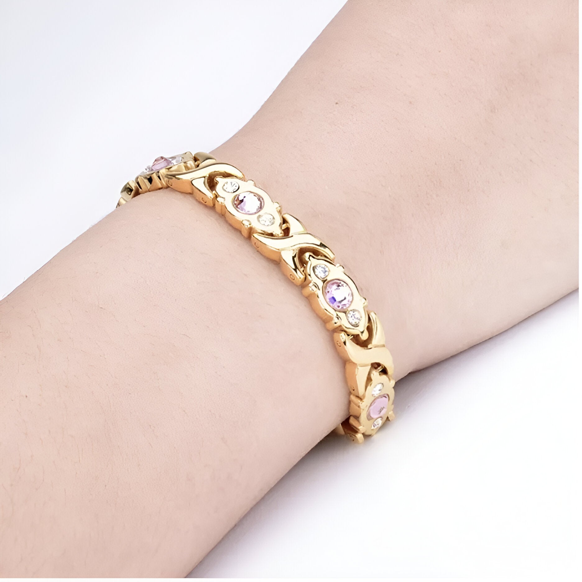 Bracelet magnétique en titane or avec zirconium rose serti, modèle Kari, finition brillante.