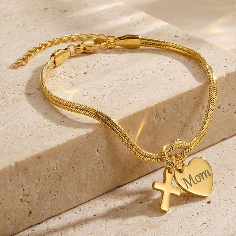 Bracciale a maglia serpente in acciaio inossidabile dorato, nodo centrale simbolico, ciondolo a forma di cuore personalizzabile con incisione e croce delicata, modello Kidé