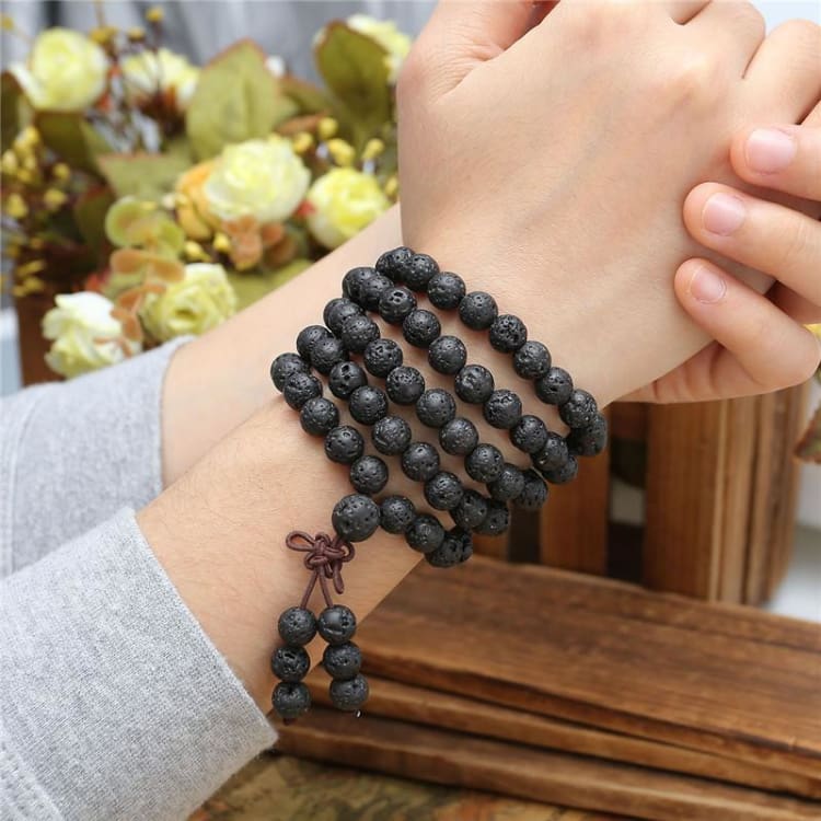 Tibetan Mala Bracelet, volcanic rock energy, porous round beads, balance and serenity, Nuba model