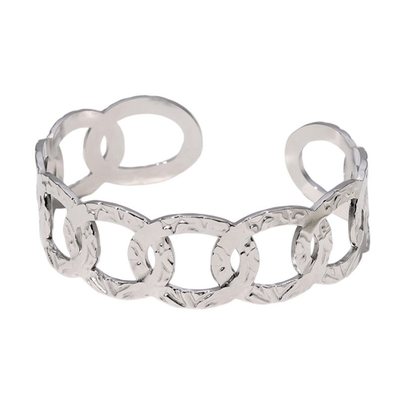 Bracelet manchette doré, ovales entrelacés, en acier inoxydable, modèle Astraïa - La Boutique du Bracelet