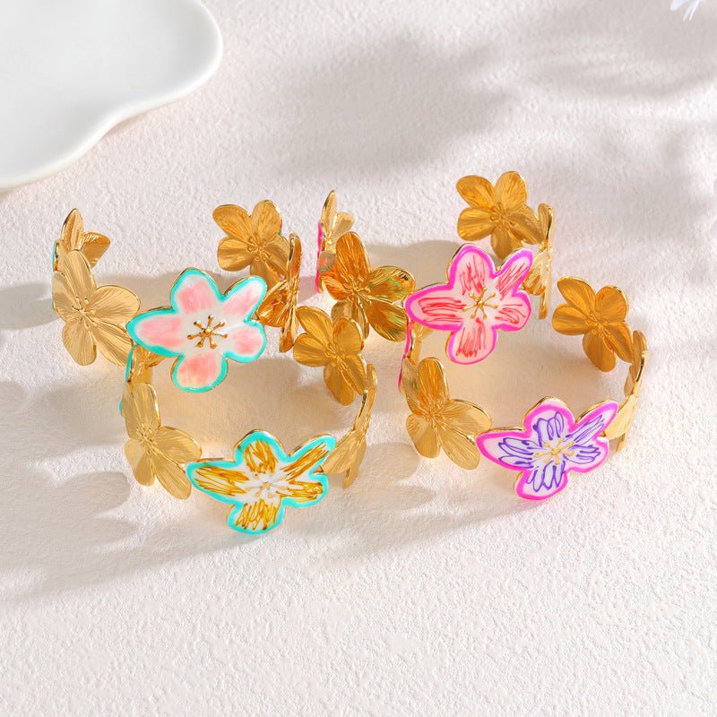 Bracelet manchette femme, motif floral coloré, acier inoxydable doré, bijou ajustable, éclat printanier, modèle Déssima