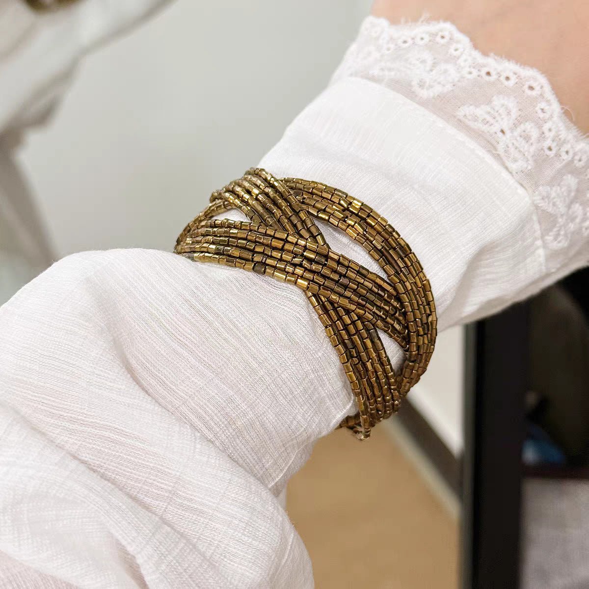 Bracelet manchette multi-rangs en perles tressées, finition bronze vieilli, pour femme, modèle Fadine