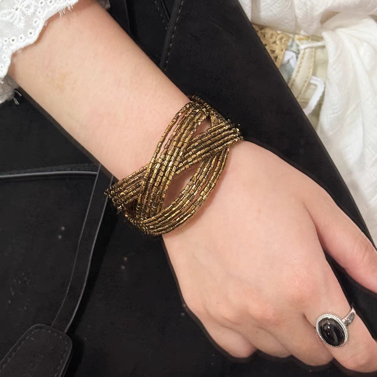 Bracelet manchette multi-rangs en perles tressées, finition bronze vieilli, pour femme, modèle Fadine