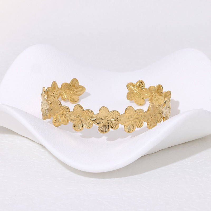Bracelet manchette floral, fleurs scintillantes, en acier inoxydable, modèle Oraya - La Boutique du Bracelet