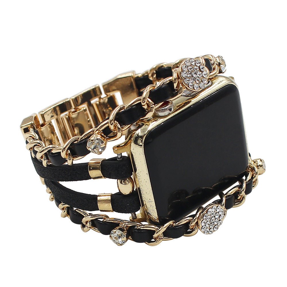 Bracelet montre Apple Watch noir simili cuir tressé avec chaîne dorée et strass brillants élégants.