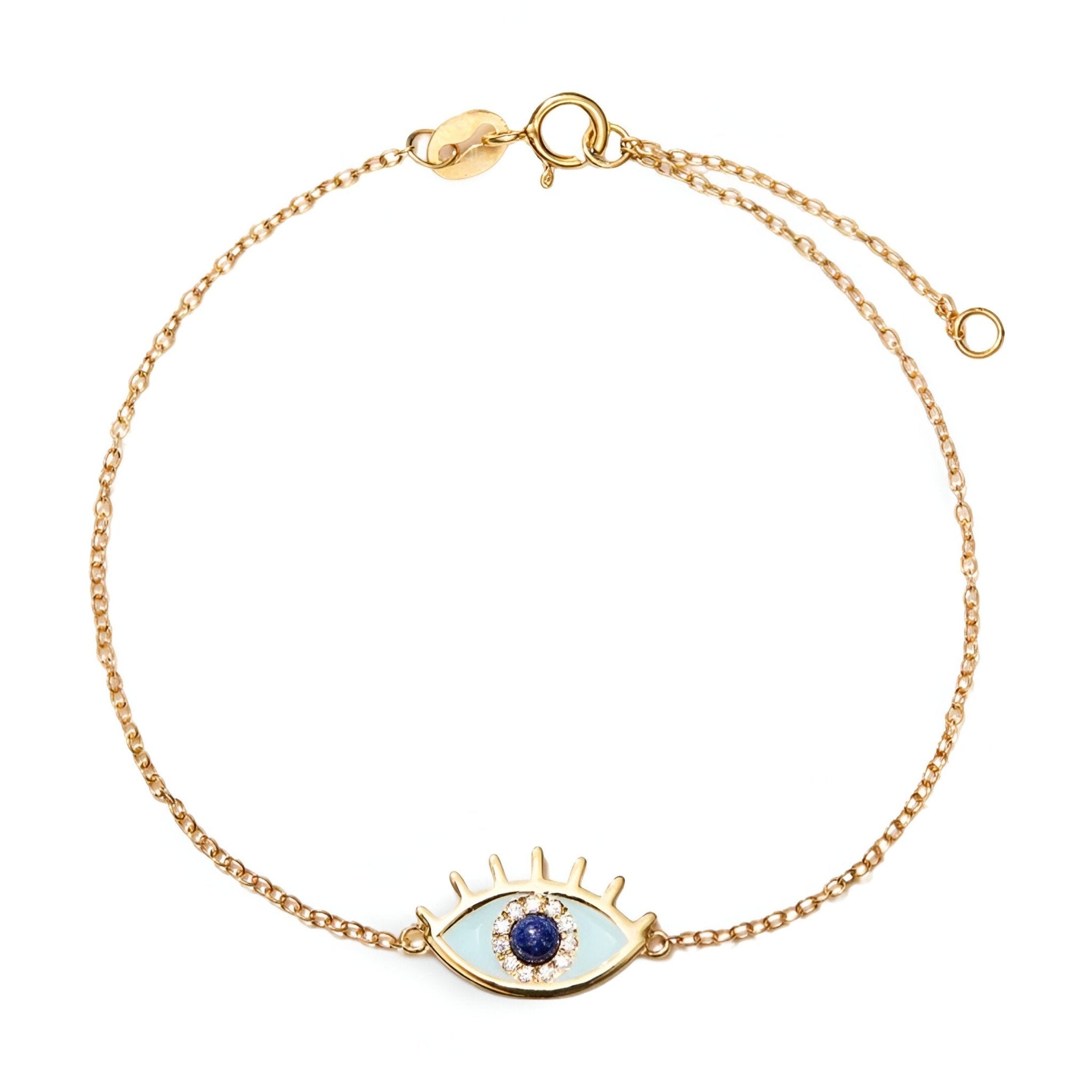 Bracelet en argent sterling doré avec pendentif œil bleu et cils stylisés.