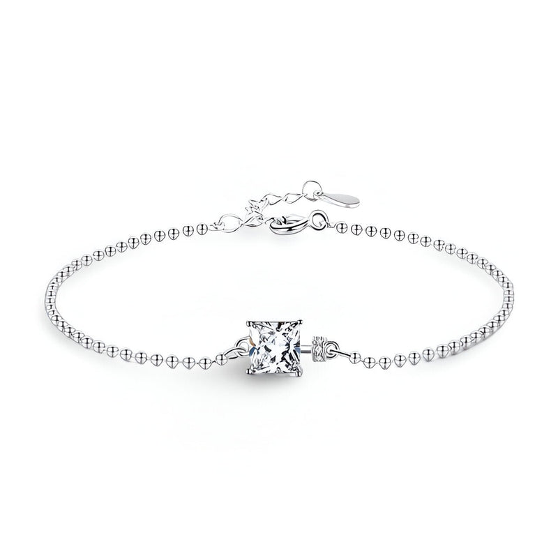 Bracelet fin en argent sterling avec chaîne à petites perles et pierre de tourmaline carrée transparente.