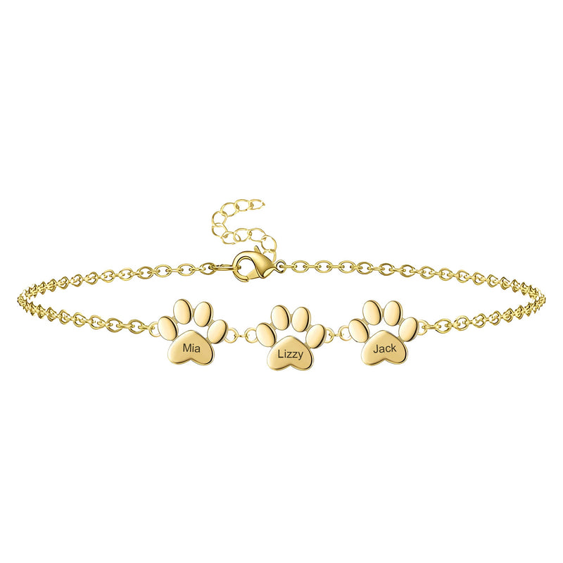 Bracelet en acier inoxydable doré avec trois pendentifs patte gravés Ma, Lucy, Jack.