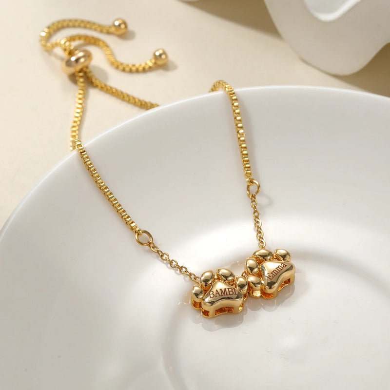 Bracelet personnalisé en acier inoxydable or avec pendentifs 2 pattes style Bambi réglable.