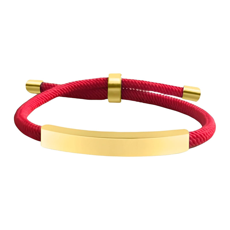 Bracelet cordon nylon rouge avec barre et embouts en acier inoxydable doré, fermoir coulissant.