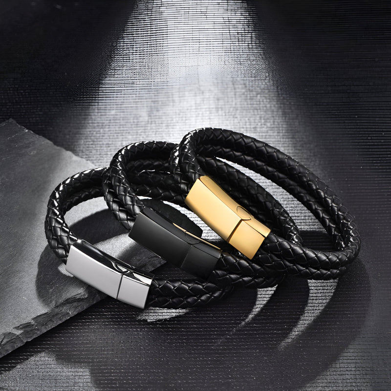 Bracelet double tour en cuir noir tressé avec fermoir métallique rectangulaire doré, argenté et noir mat.