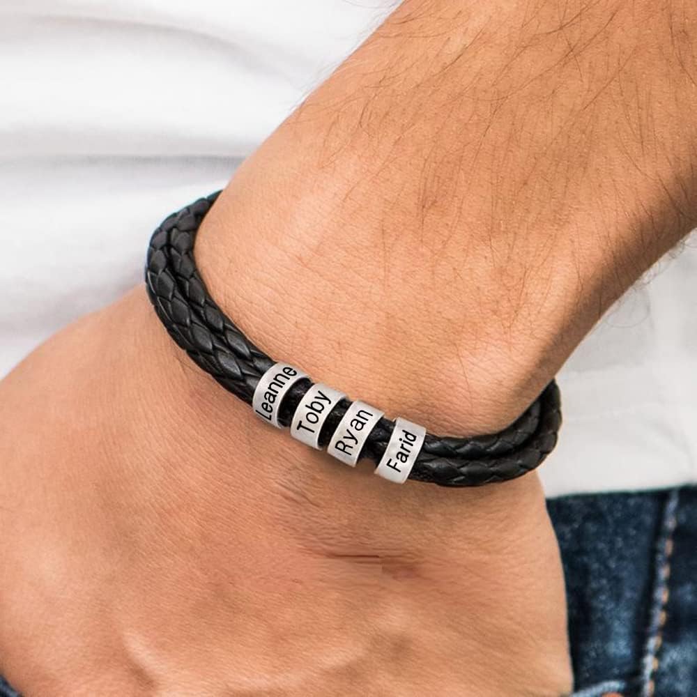 Bracelet triple tour en cuir noir tressé avec quatre anneaux argentés gravés, style Atlos.