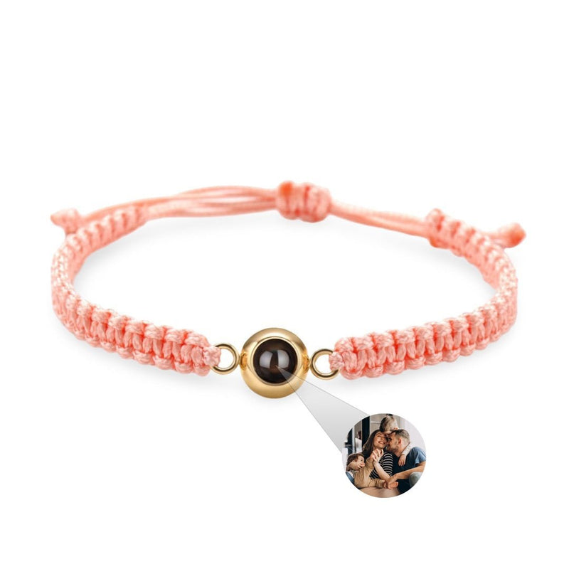 Bracelet corde rose avec médaille en titane or rosé et insert photo personnalisable.