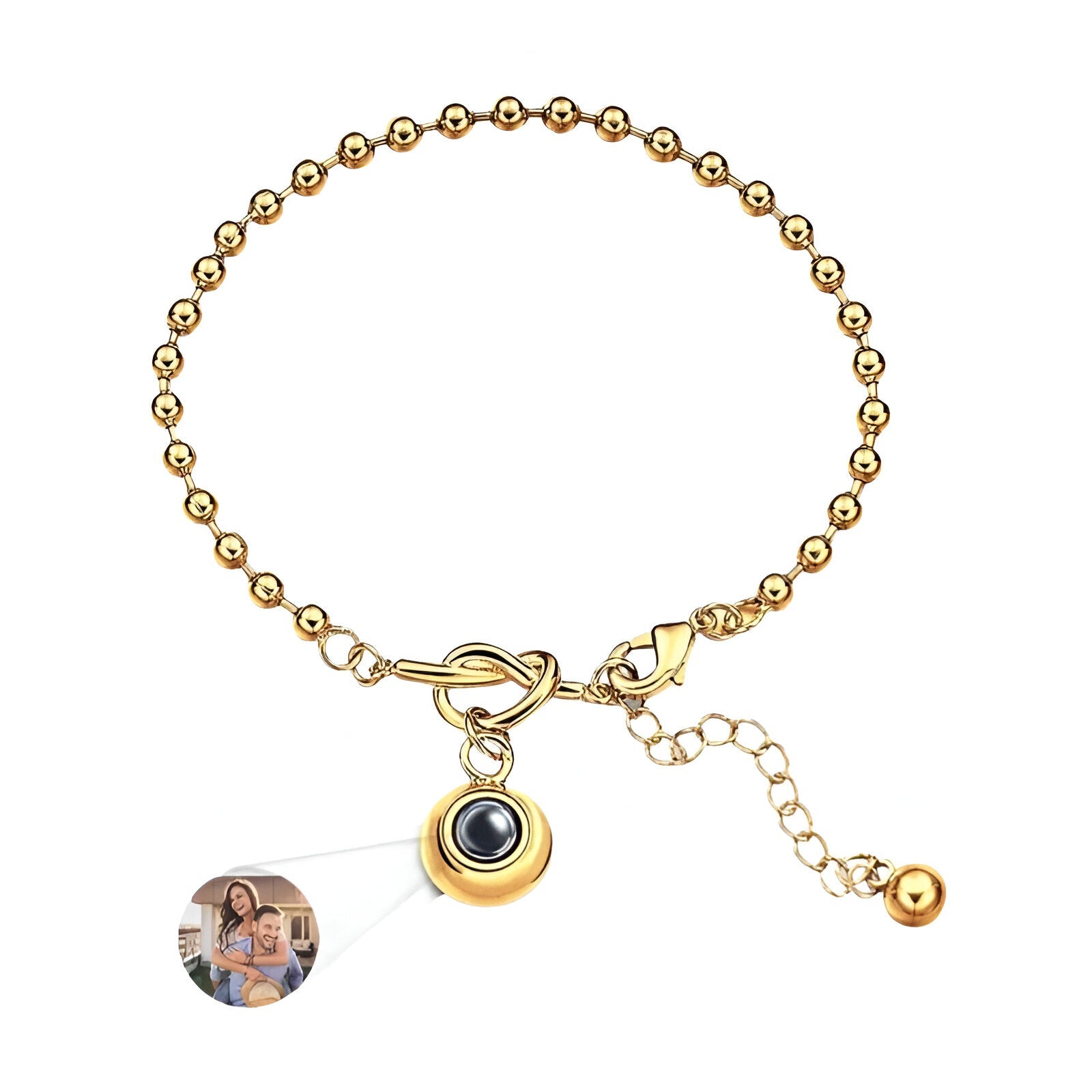 Bracelet femme en acier inoxydable doré à billes avec pendentif photo à nœud central et chaîne réglable.