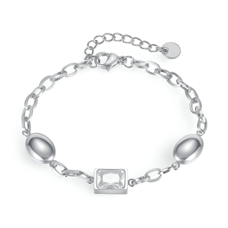 Bracelet femme en acier inoxydable argent avec cube de zirconium rectangulaire et maillons ovales.