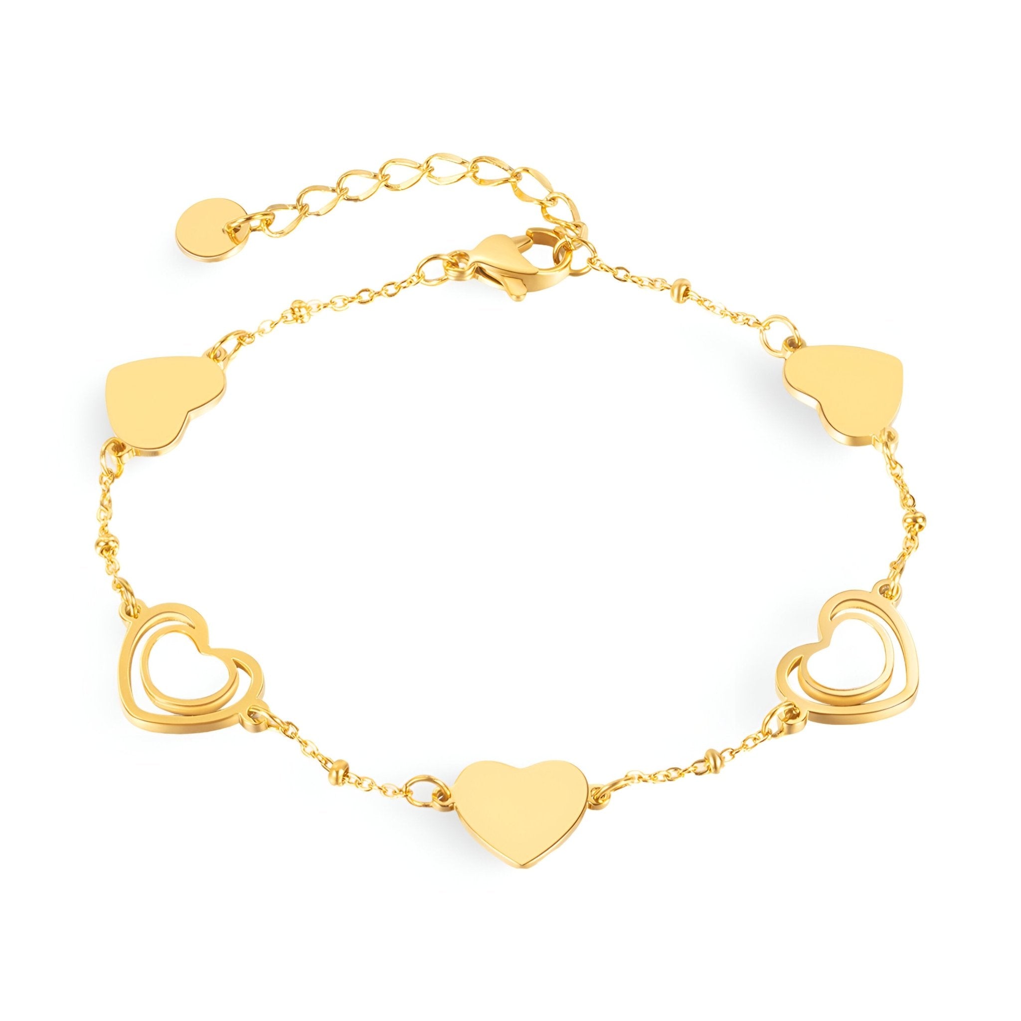Bracelet fin en acier inoxydable doré avec cœurs pleins et ouverts alternés, modèle Louisa.