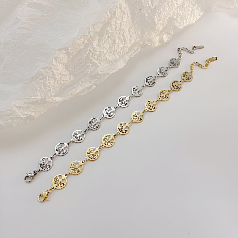 Bracelet femme acier inoxydable argent avec pendentifs arbre de vie ronds et chaîne fine .