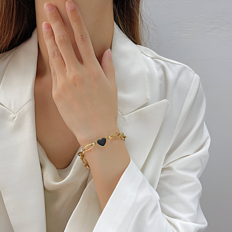 Bracelet pour femme, en acier inoxydable, orné d'un coeur noir, modèle Solange