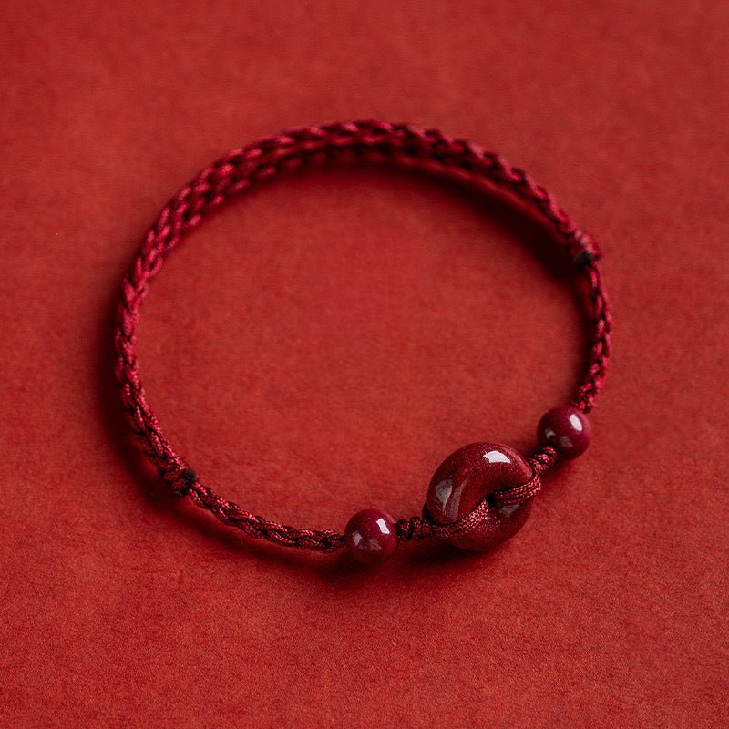 Bracelet pour l'esprit, porte - bonheur, en coton fil rouge, orné de cinabres, modèle Terya - La Boutique du Bracelet