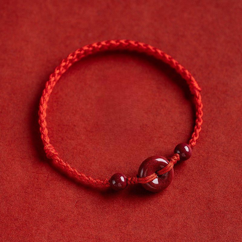 Bracelet pour l'esprit, porte - bonheur, en coton fil rouge, orné de cinabres, modèle Terya - La Boutique du Bracelet