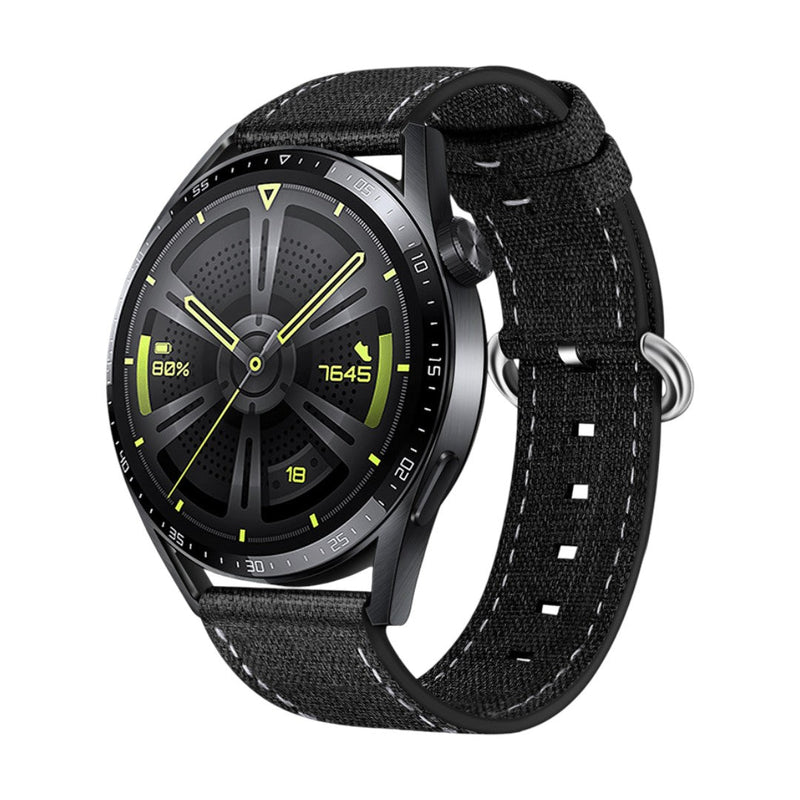 Bracelet montre en nylon noir à boucle ardillon argentée, style moderne et résistant à l’eau.