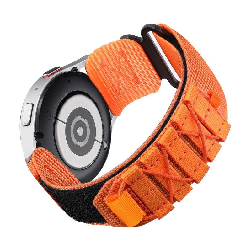 Bracelet sport en nylon orange avec fermoir velcro noir pour montre connectée Samsung Galaxy Watch.