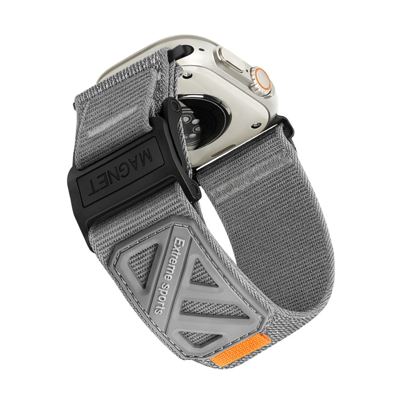 Bracelet nylon gris tissé avec fermoir magnétique robuste pour Apple Watch, design résistant et sport extrême.
