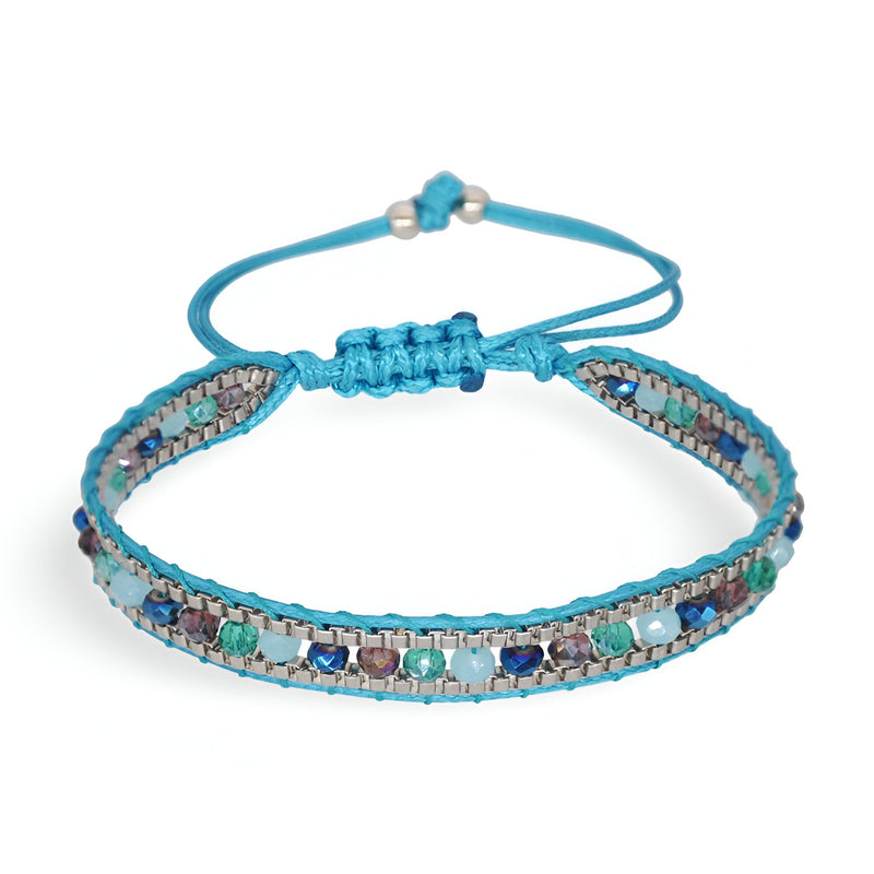 Bracelet tressé turquoise avec perles de riz multicolores et fermeture coulissante ajustable.