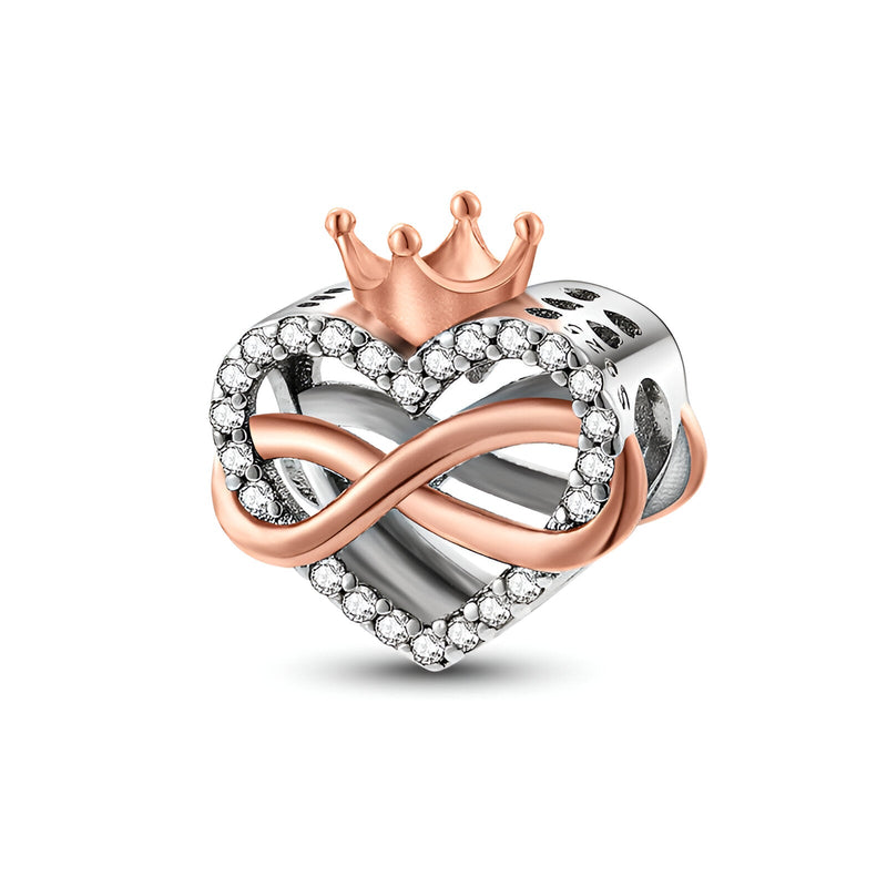 Charm cœur en argent et or rose avec couronne et incrustation de cristaux brillants.