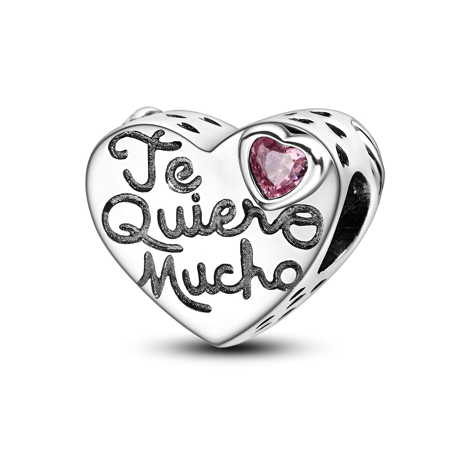 Charm cœur argenté gravé "Te quiero mucho" avec petit cœur rose serti, modèle Sunniva.