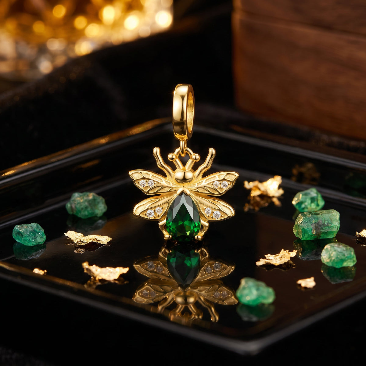 Luminescent firefly charm, green teardrop stone, wings set with zircons, model Emerald Drop Firefly