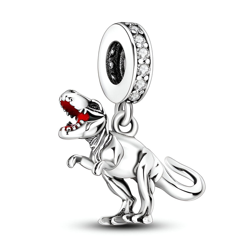Charm pendentif T-rex en argent avec gueule ouverte et cristaux sur l'anneau passant.