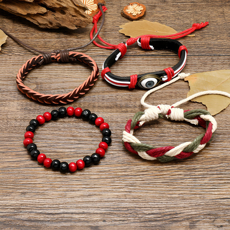 Ensemble de 4 bracelets homme en cuir tressé et perles noires et rouges avec œil de protection rouge et blanc.