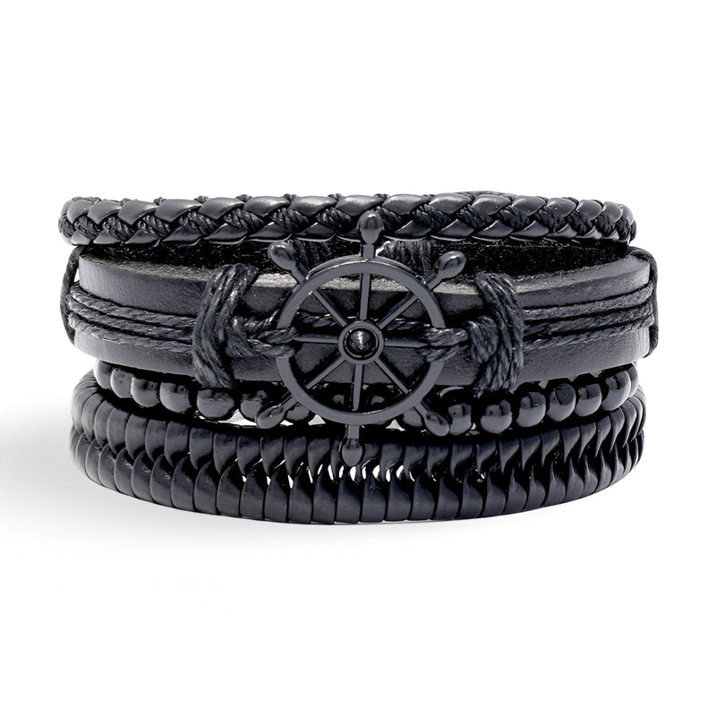 Ensemble de 4 bracelets noirs en cuir tressé et lisse avec motif gouvernail métallique central.