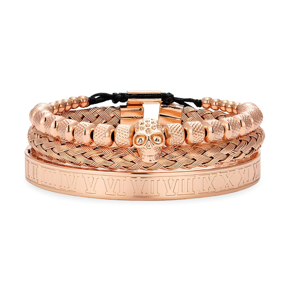 Trio de bracelets en acier inoxydable or rosé avec tête de mort centrale, tressé et gravé chiffres romains.