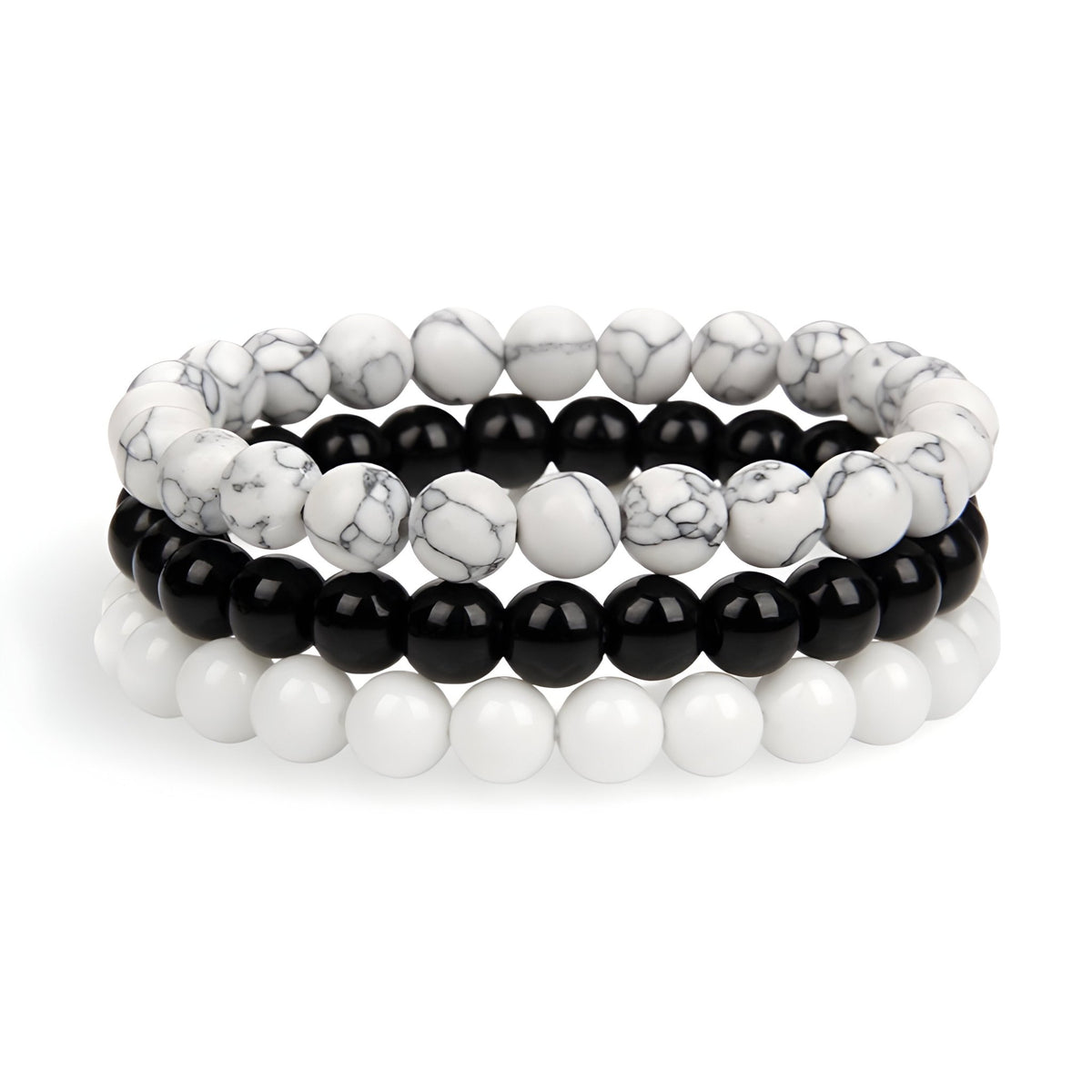 Trio de bracelets mixte en howlite blanche et noire, design naturel élégant.
