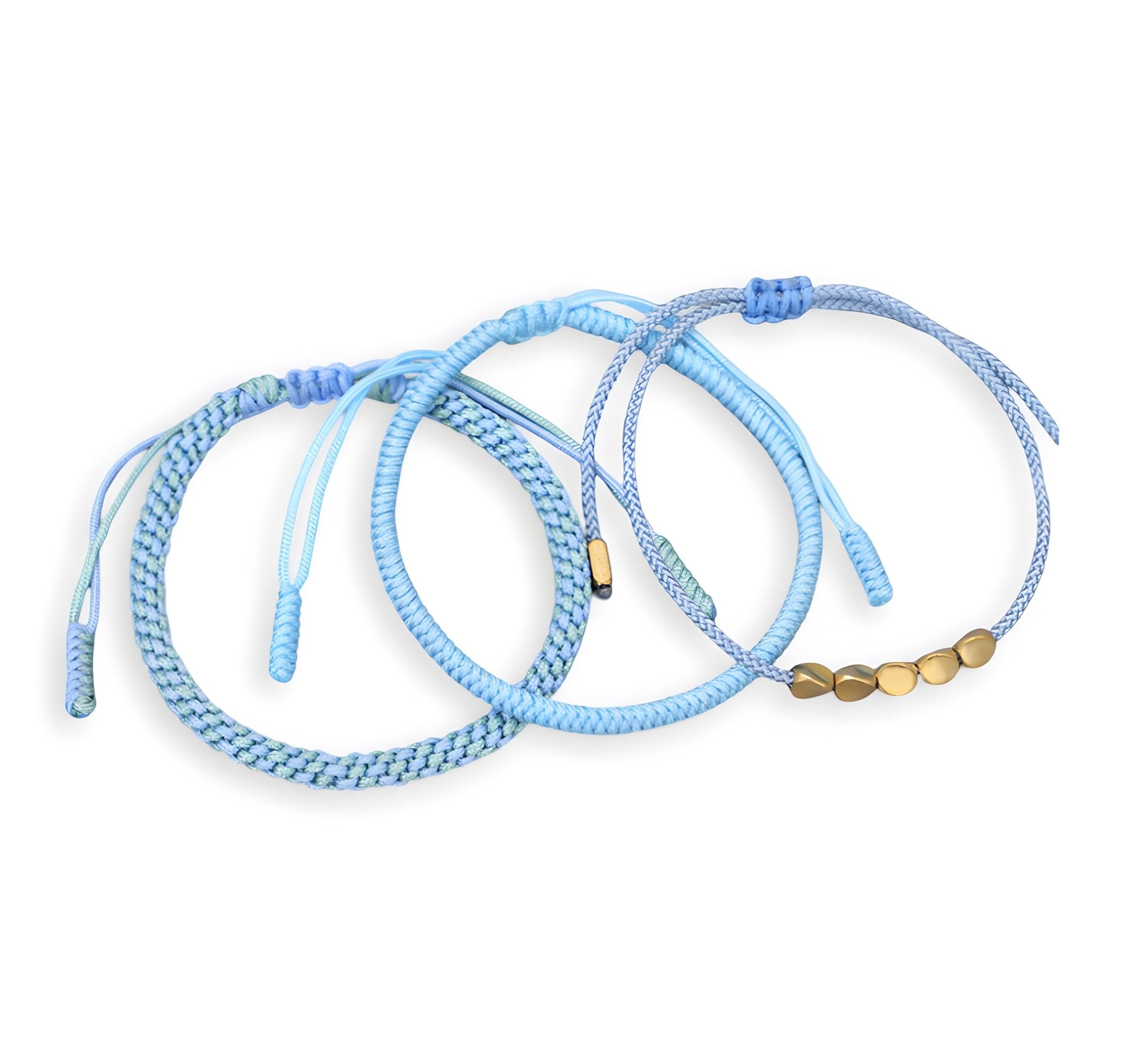 Trio de bracelets tibétains en corde bleu clair avec perles en cuivre pour femme.