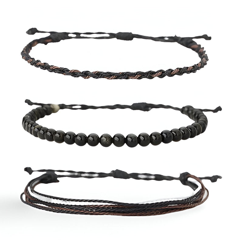 Trio de bracelets tibétains pour homme en pierres noires et fil ciré noir et marron.