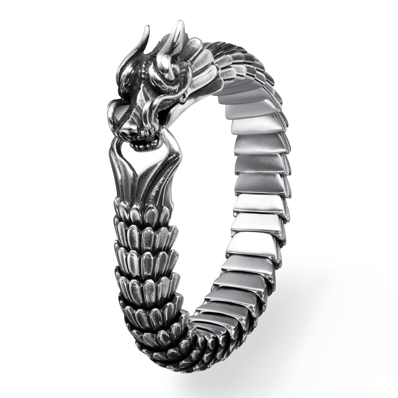 Bracelet homme acier inoxydable argent en forme de dragon stylisé avec détails écailleux et tête sculptée.