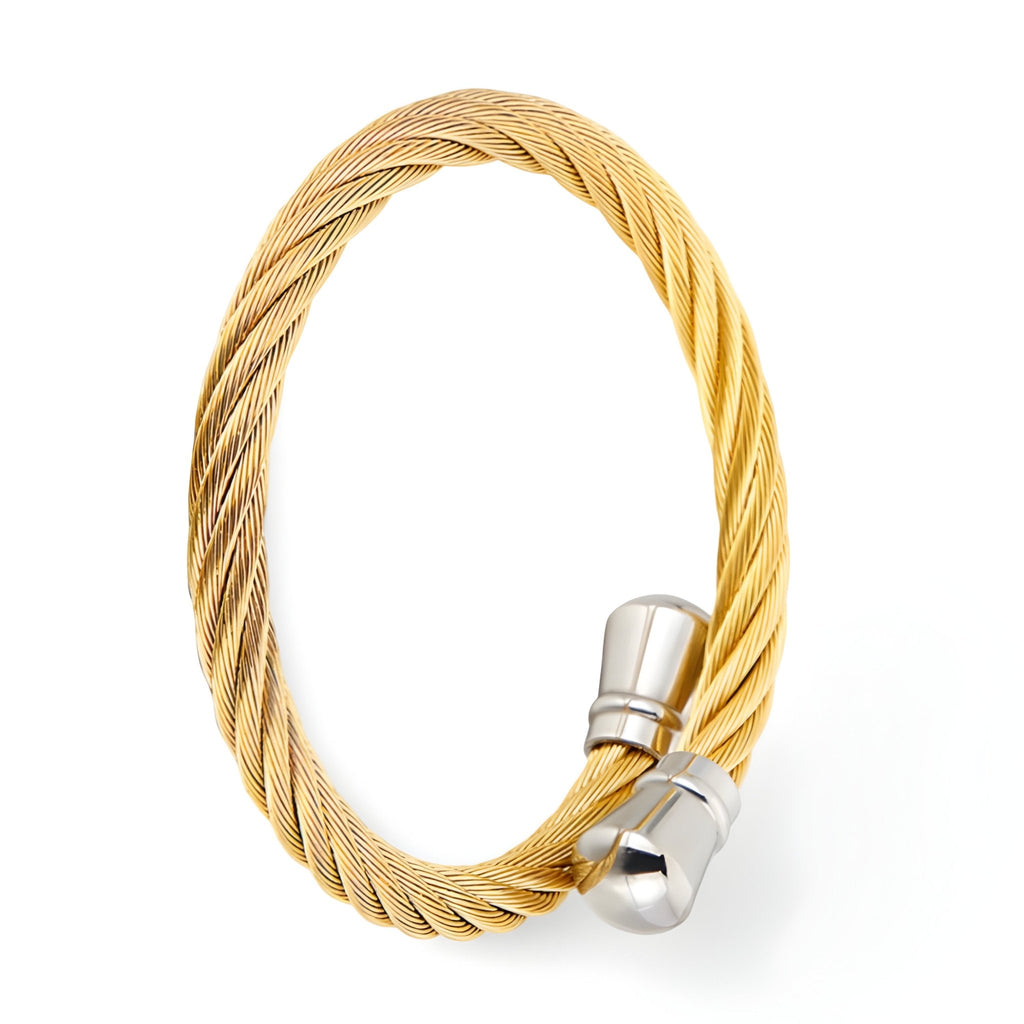 Bracelet jonc en acier inoxydable doré tressé avec fermoir argenté lisse.