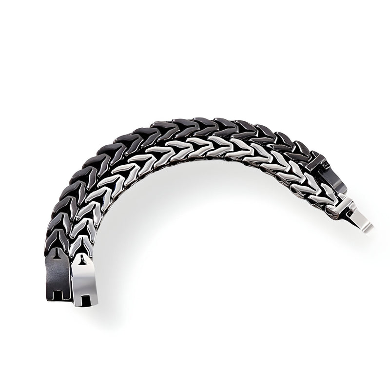 Bracelet homme en acier inoxydable noir et argent, maille spiga, fermoir sécurisé.