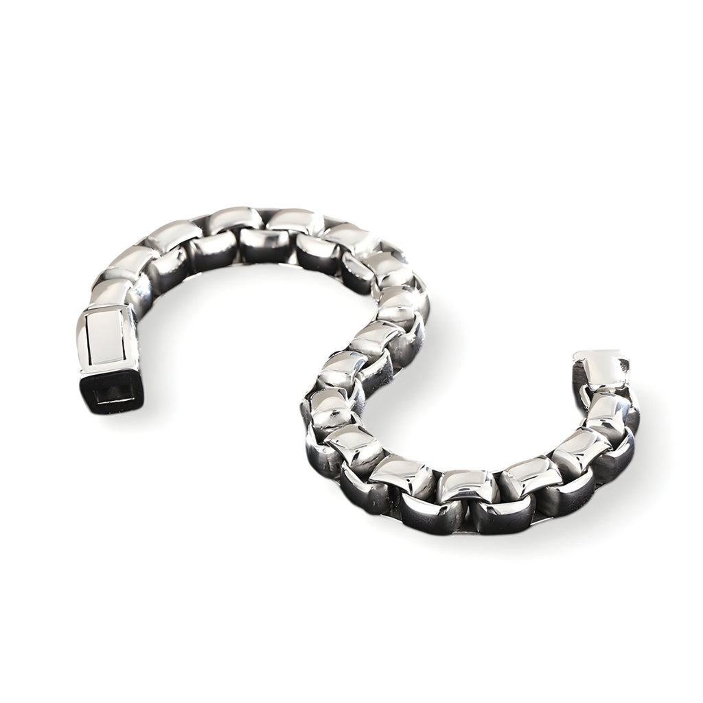 Bracelet homme en acier inoxydable argenté, maille vénitienne épaisse, fermoir rectangulaire noir.