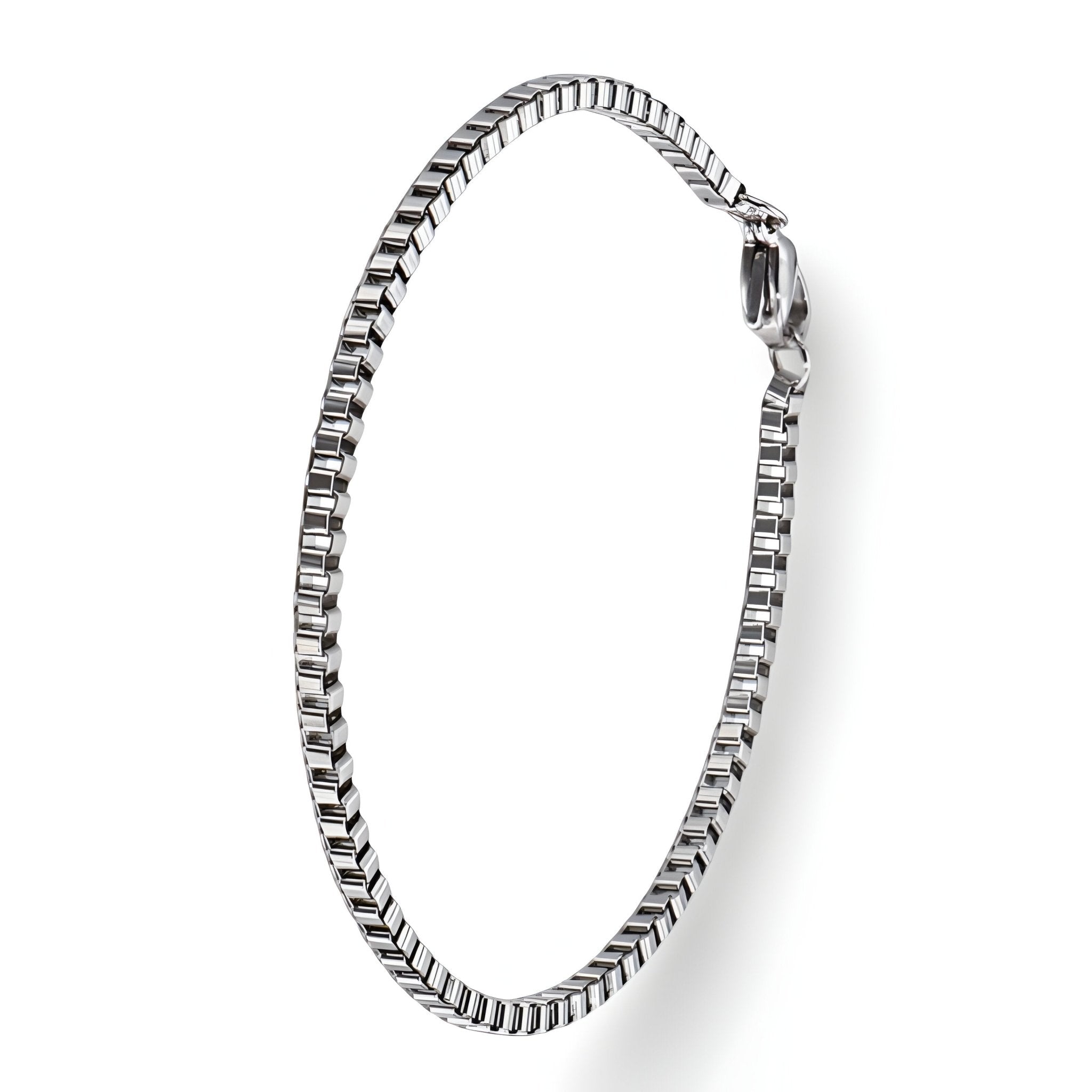 Bracelet homme en acier inoxydable argenté à maille vénitienne fine avec fermoir sécurisé.