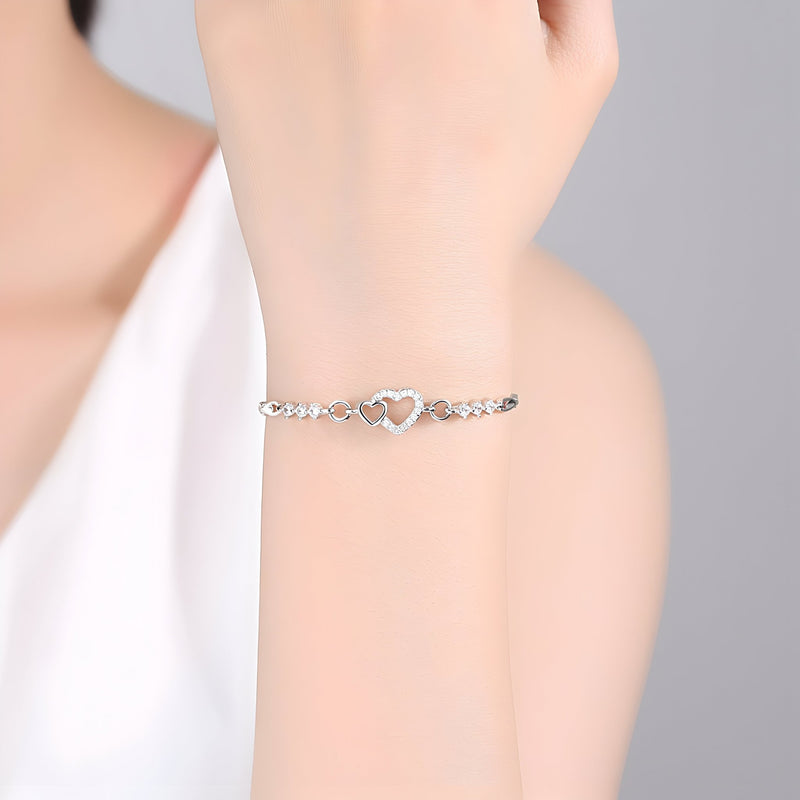 Pulsera de plata maciza para mujer, charm doble corazón, modelo Judith